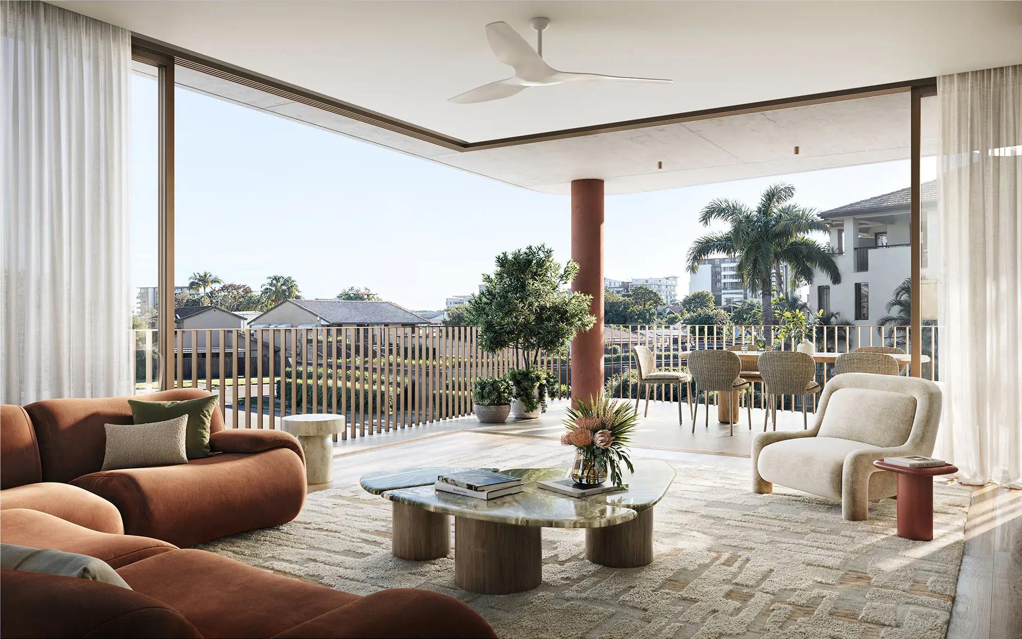 Open-plan living opening to the alfresco balcony with canal views